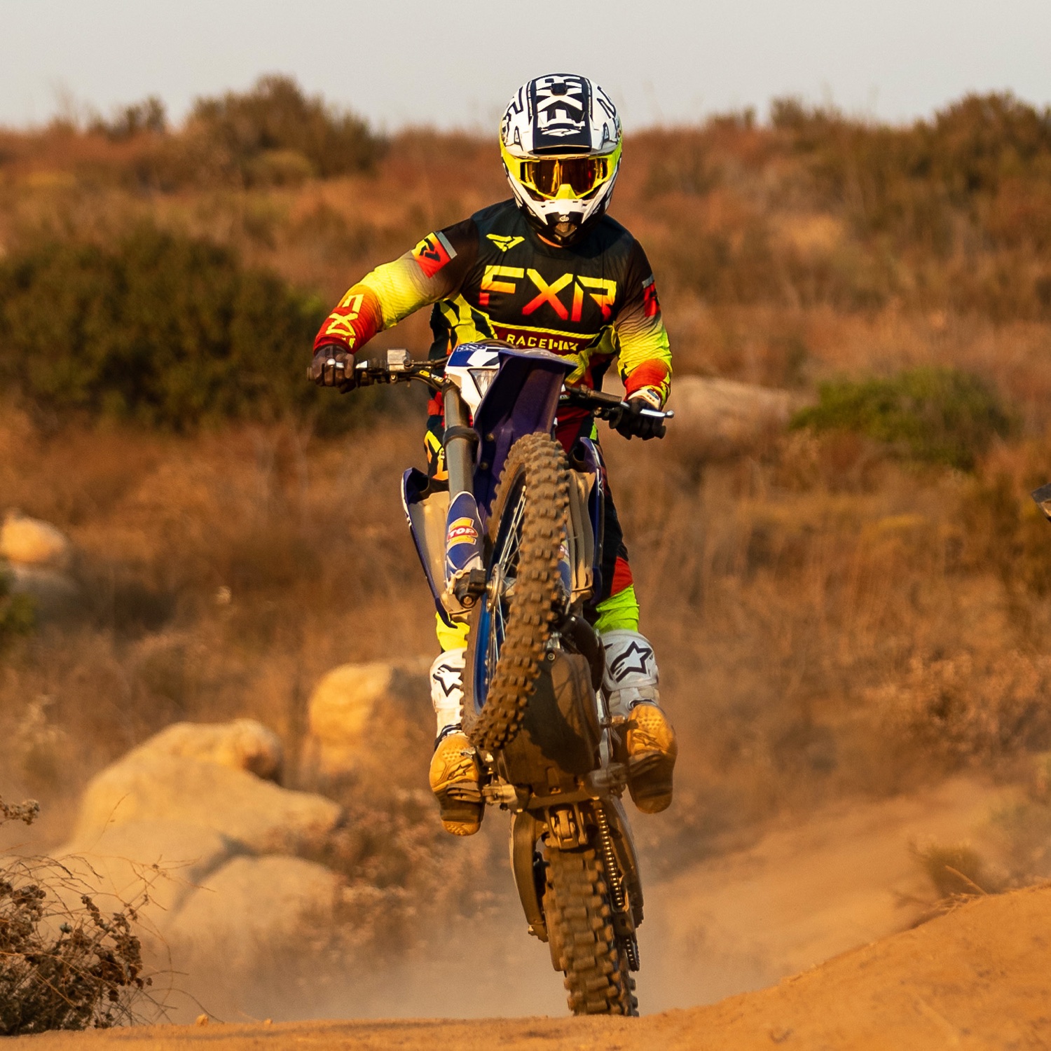 Daniel Sedlak riding an enduro motorcycle on a dirt trail